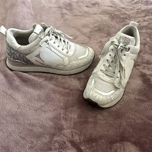 Michael Kors shoes, white with silver. Used twice. Good condition.